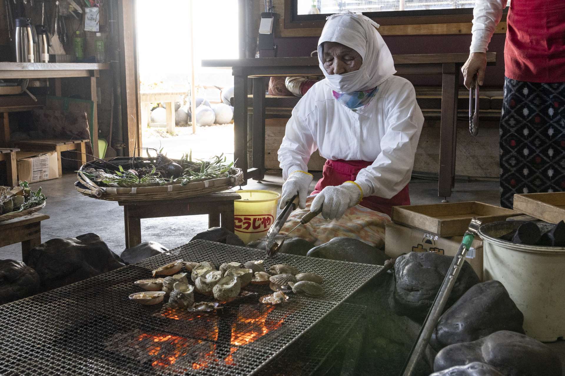 Retired ama divers help welcome guests to the restaurant, where they continue to share their food and culture with us. 