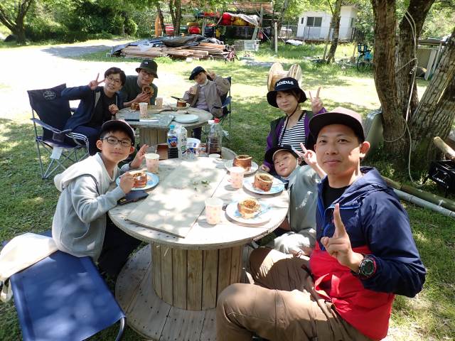 Gathering around a fresh baumkuchen for teatime