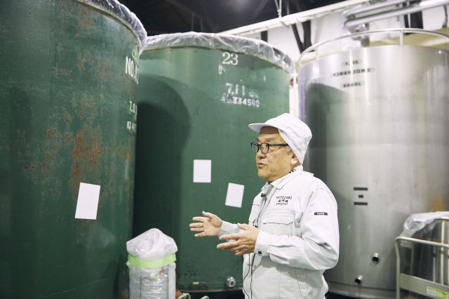 Touring the sake brewery.