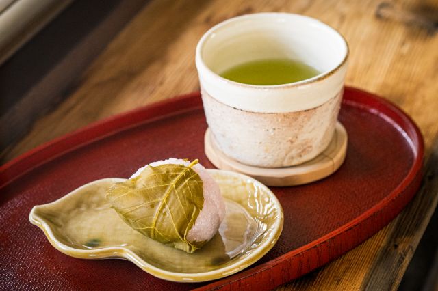 Welcome tea and wagashi sweets are served